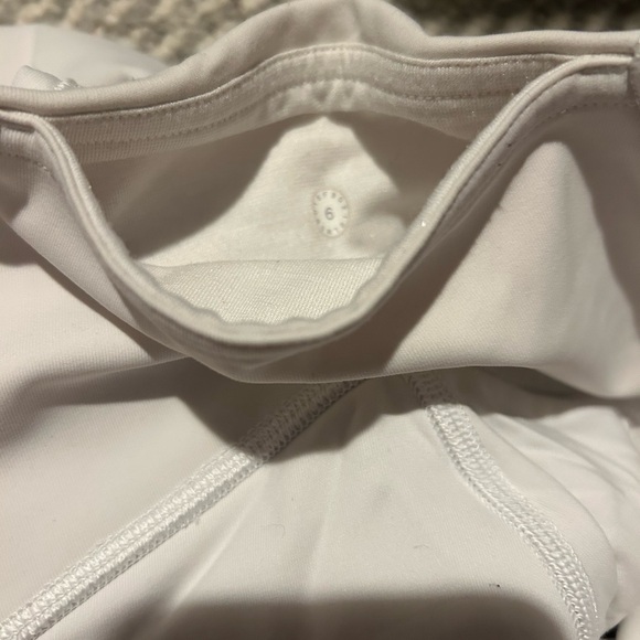 Lululemon white leggings with see through detail on lower legs. - Picture 7 of 8